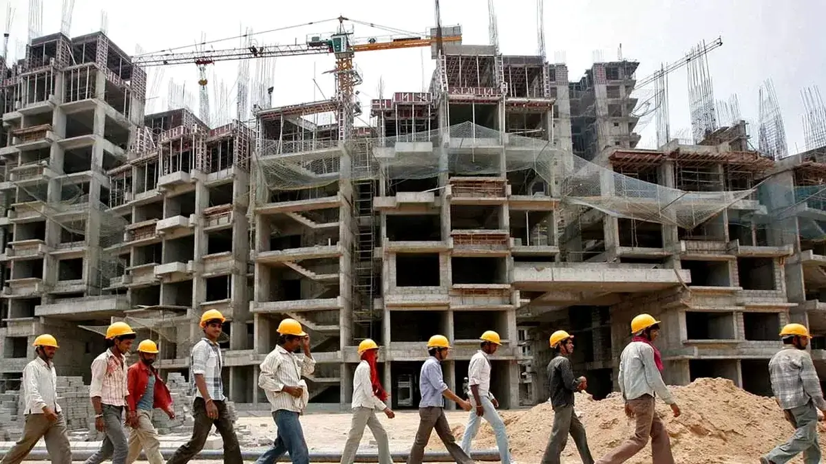 Construction workers in India — crane hire demand driven by infrastructure growth